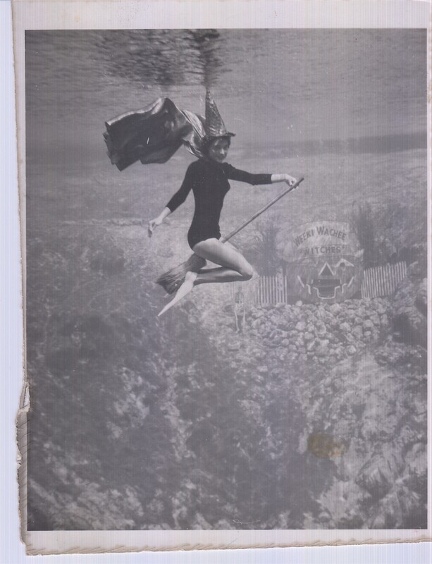 Mermaid Geanie L.W. Brooks Dressed as a Witch Posing Underwater