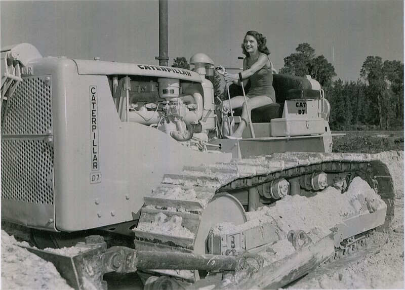 Geanie L.W. Brooks in Weeki Wachee Springs Mermaid Uniform Operating a Caterpillar D-7 Bulldozer