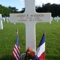 Headstone of Private James Robert Maddox at Epinal American Cemetery and Memorial