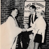 Florence McNabb, Charles McNabb, and Their Two Sons, David and Michael, Leaving Church