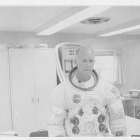 Dr. Calvin D. Fowler Trying on a Space Suit at John F. Kennedy Space Center