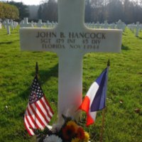 Headstone of Sergeant John B. Hancock at Epinal American Cemetery and Memorial
